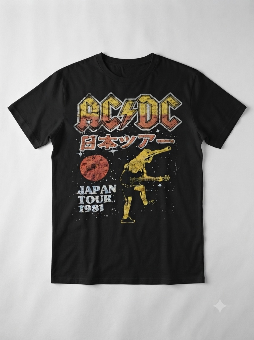 AC/DC logo, Japanese tour text, red sun graphic, and guitar player